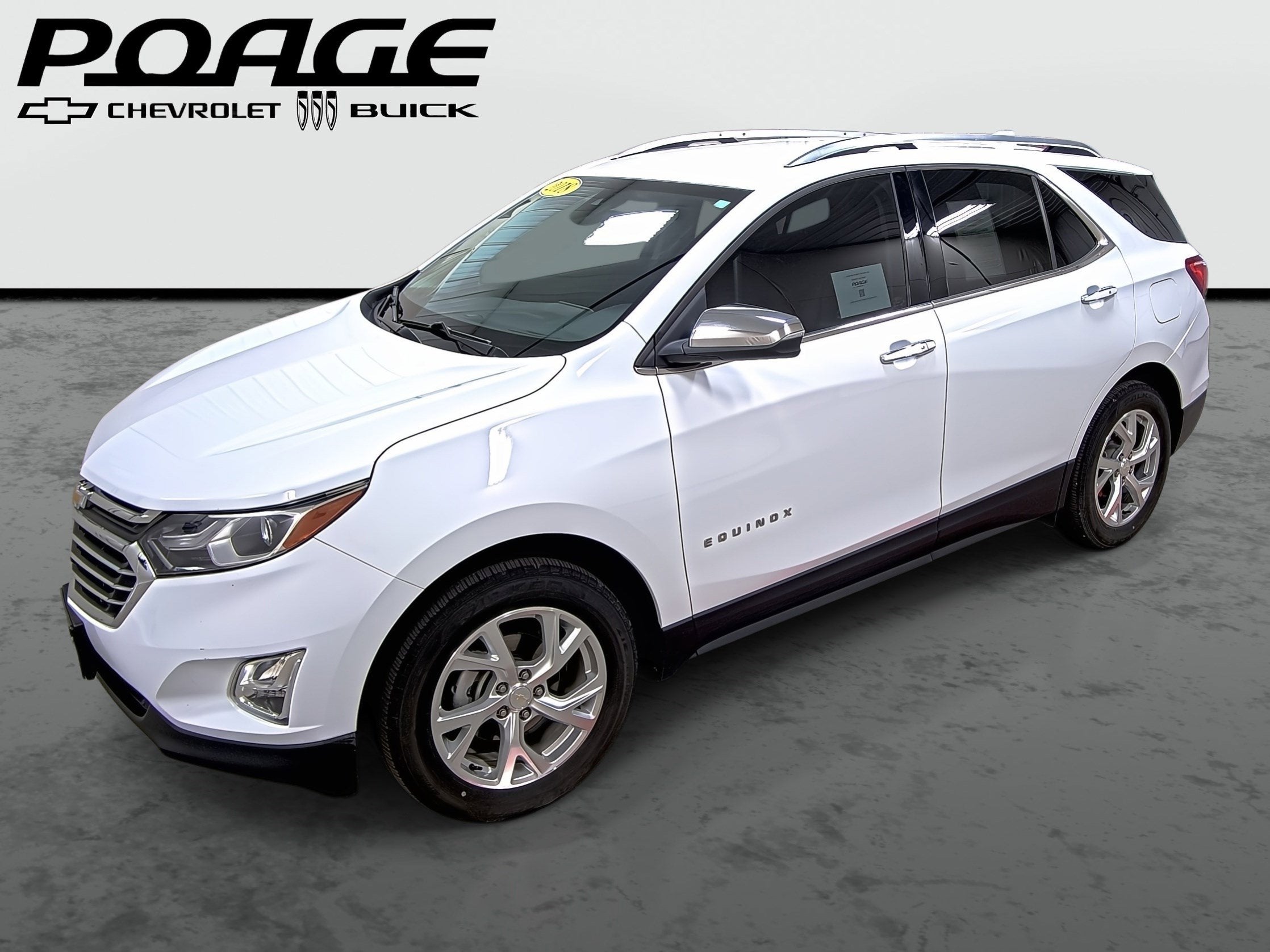 2018 Chevrolet Equinox Premier in Summit White — front three-quarter view