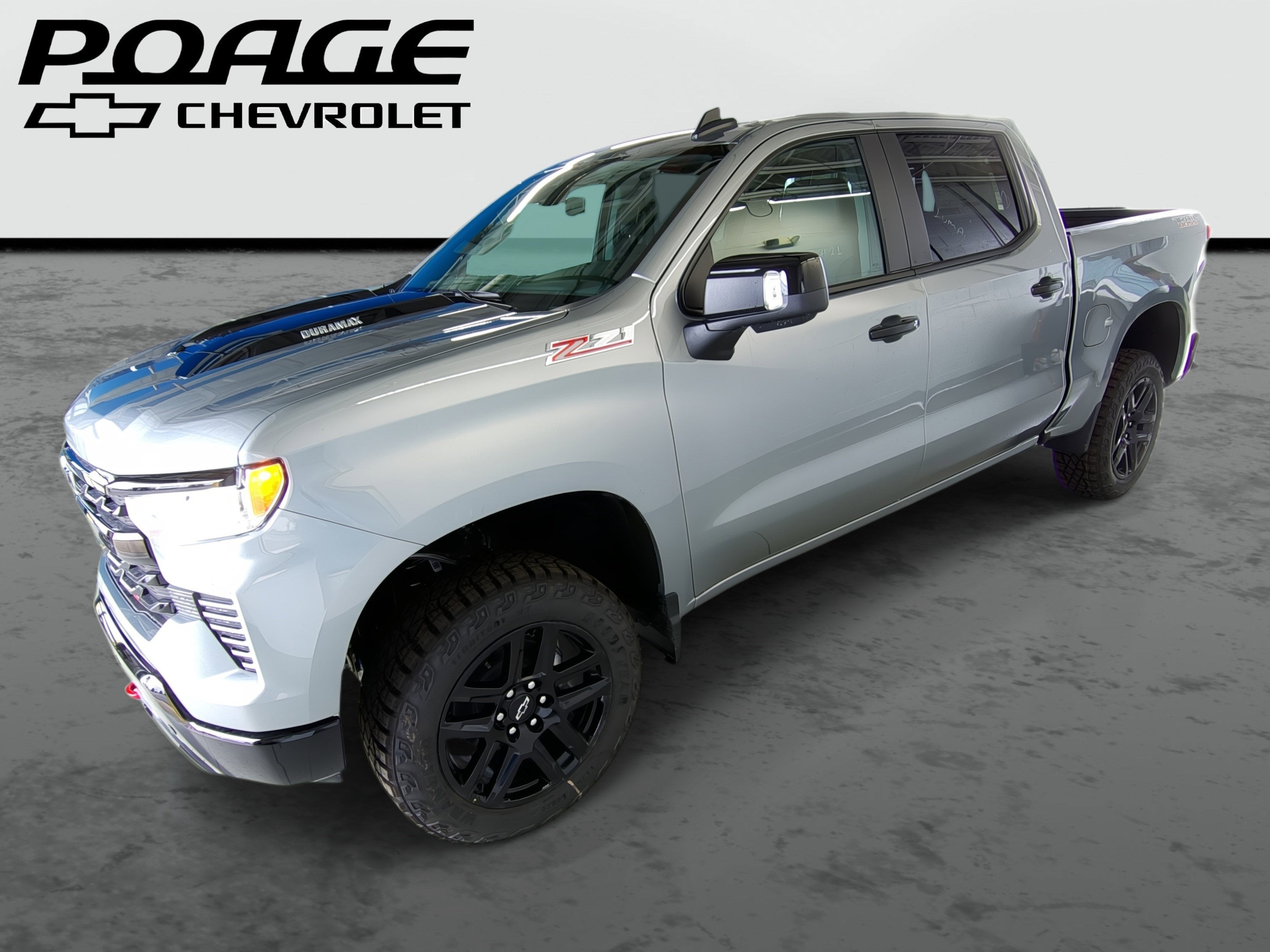 2026 Chevrolet Silverado 1500 LT Trail Boss in Sterling Gray Metallic — front three-quarter view